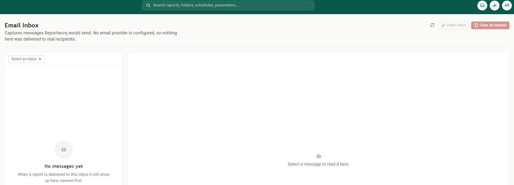 The Email Inbox, with the note that it captures messages Reportworq would send and that no email provider is configured so nothing was delivered to real recipients, an inbox selector on the left reading No messages yet, and Clean inbox and Clear all inboxes controls